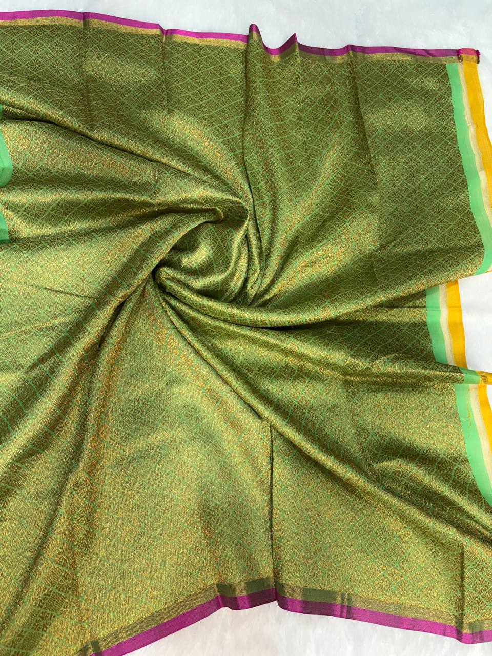 Leaf Green Tussar Silk Saree with Geometric Zari Jal & Magenta Selvedge
