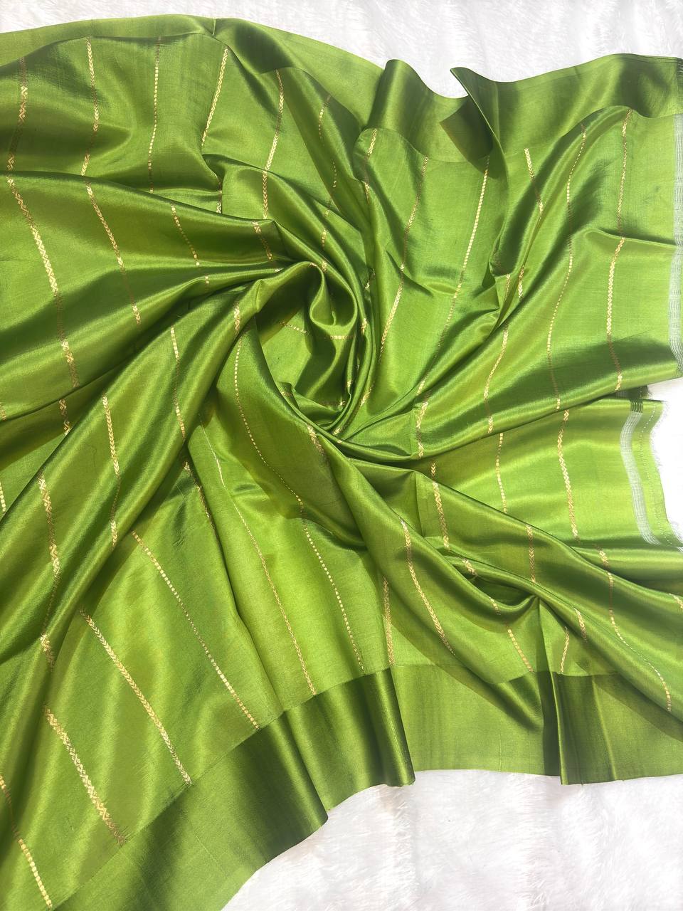 The Amra Raw Mango Green Silk Saree with Kadhua Zari Boottis