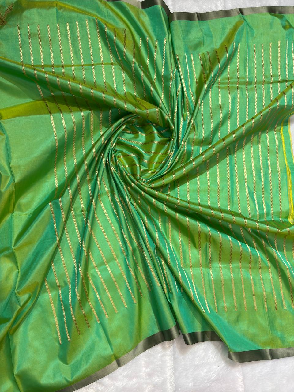 Handwoven Mint & Parrot Green Pure Katan Silk Banarasi Saree with Fine Floral Bootis and Scalloped Zari Skirt Border