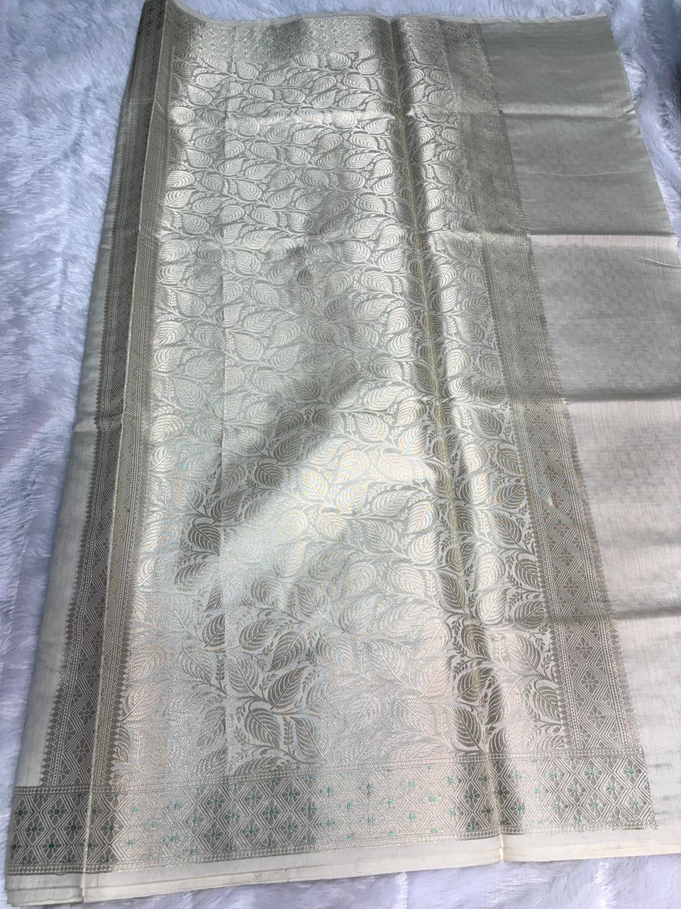 Ivory Munga Silk Banarasi Saree with Silver Zari Jaal & Turquoise Meenakari Details
