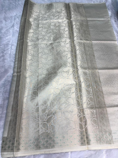 Ivory Munga Silk Banarasi Saree with Silver Zari Jaal & Turquoise Meenakari Details