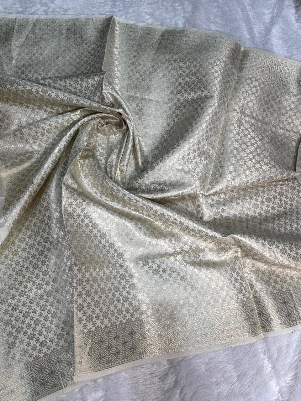 Ivory Munga Silk Banarasi Saree with Silver Zari Jaal & Turquoise Meenakari Details
