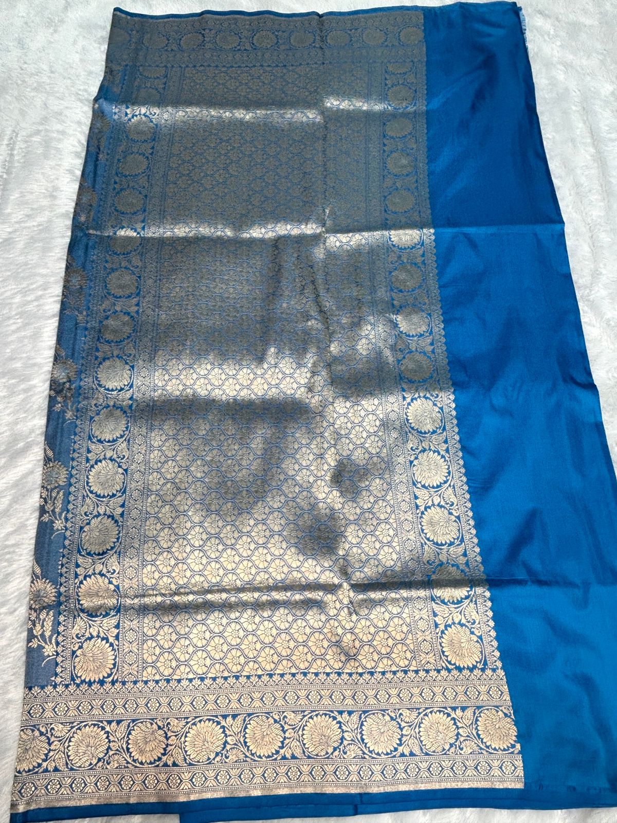 Royal Peacock Blue Pure Katan Silk Banarasi Saree with Antique Silver Zari Jaal & Floral Border