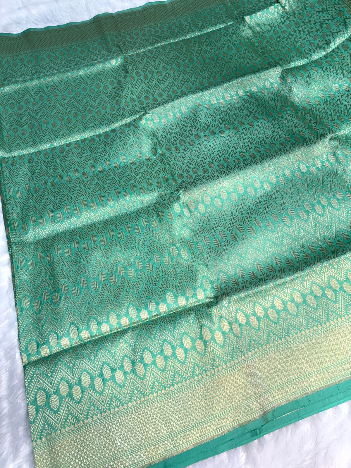Seafoam Green Pure Katan Silk Banarasi Saree with Geometric Chevron Jaal & Diamond Zari Border