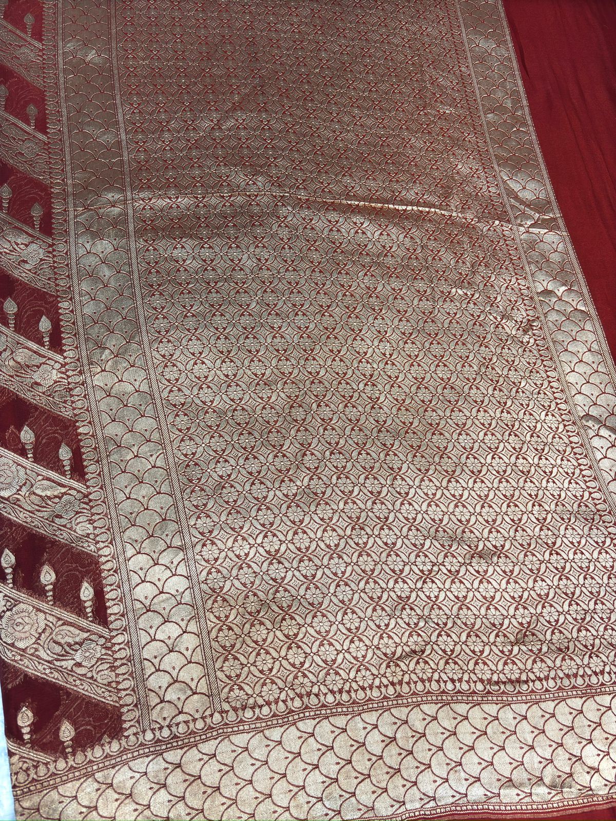 Maroon Khaddi Georgette Banarasi Saree with Striped Zari Weaving & Grand Pallu