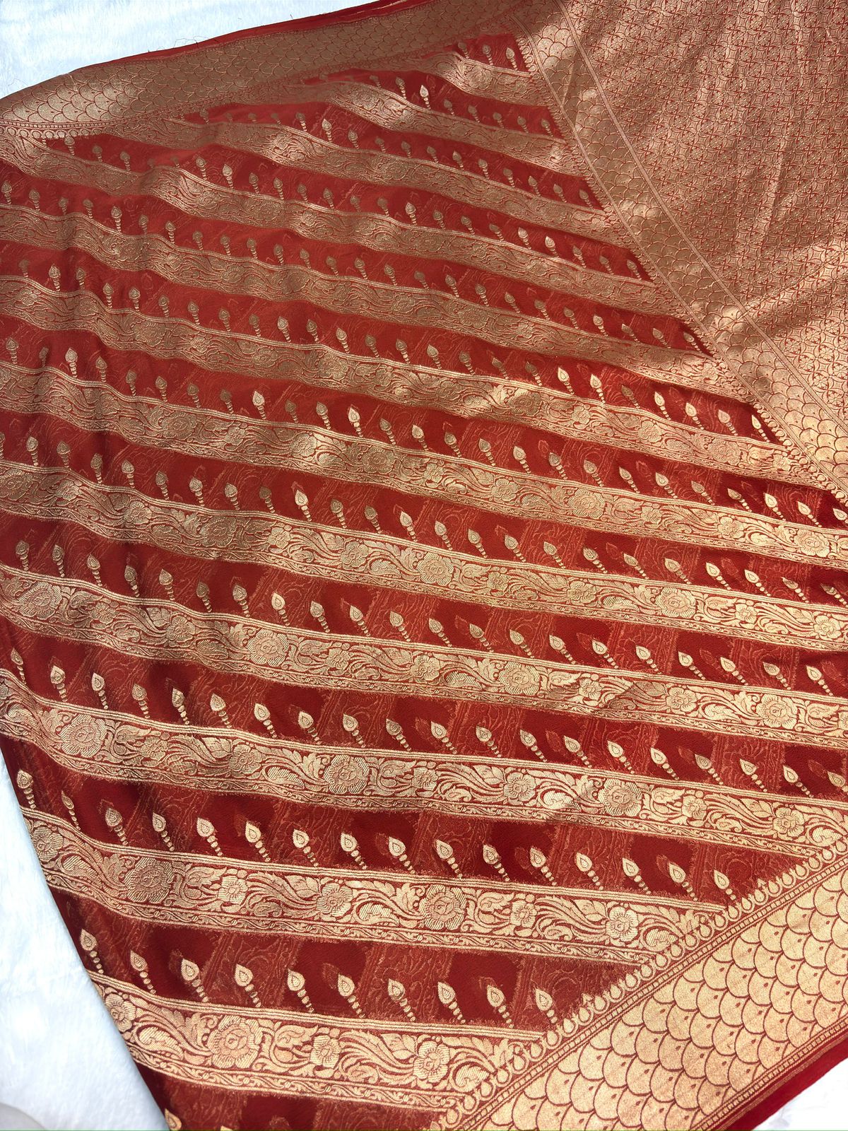 Maroon Khaddi Georgette Banarasi Saree with Striped Zari Weaving & Grand Pallu