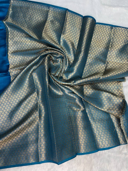 Elegant Peacock Blue Banarasi Chiniya Silk Saree with Floral Jaal and Geometric Pallu