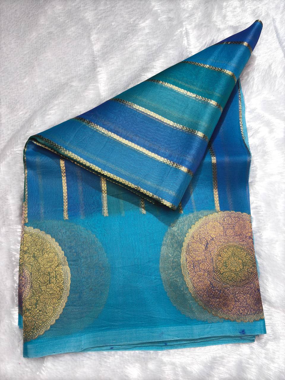 Kora Silk Rungkaat Saree in Firoza Blue with Kadhua Zari Borders