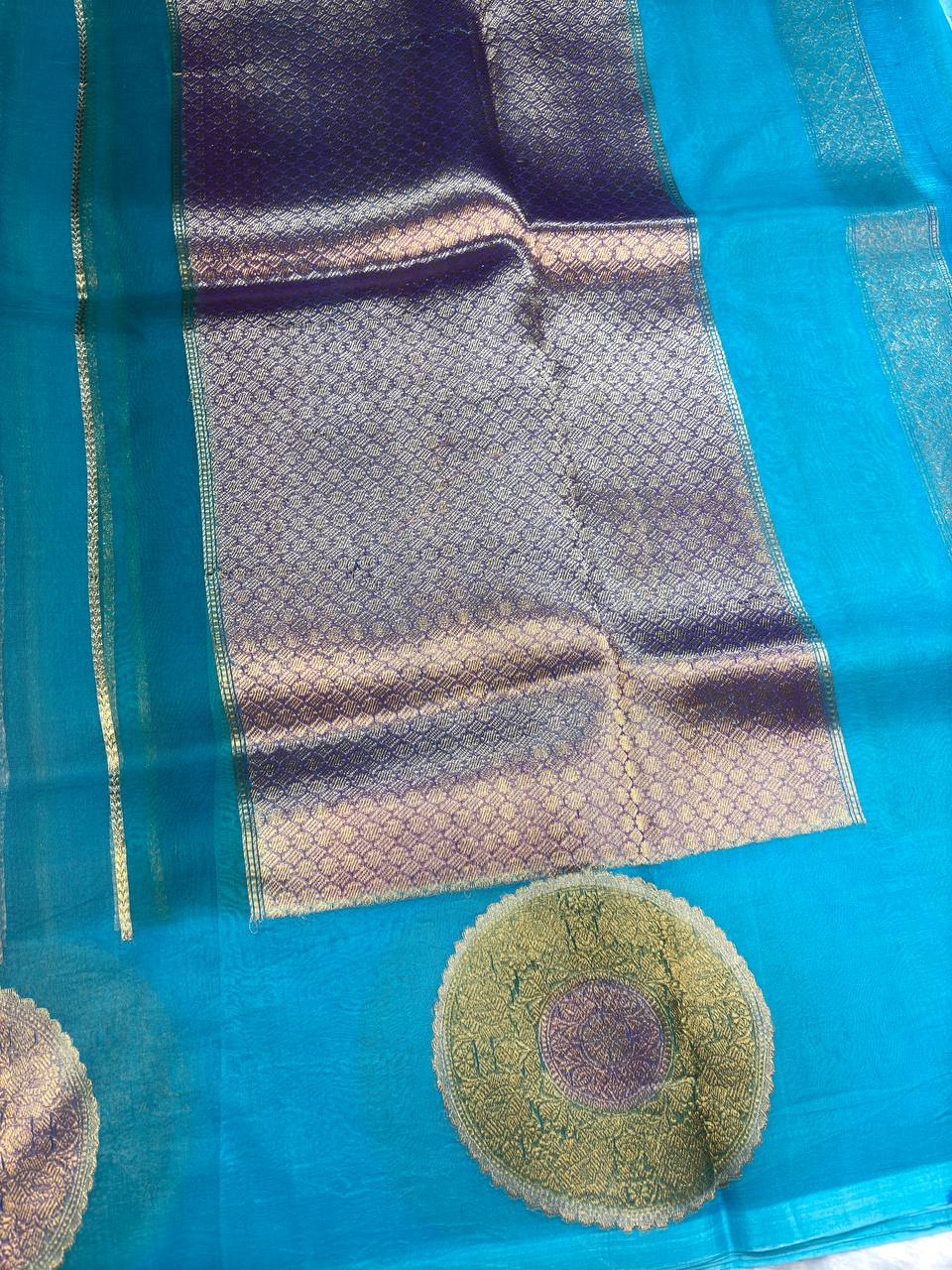 Kora Silk Rungkaat Saree in Firoza Blue with Kadhua Zari Borders
