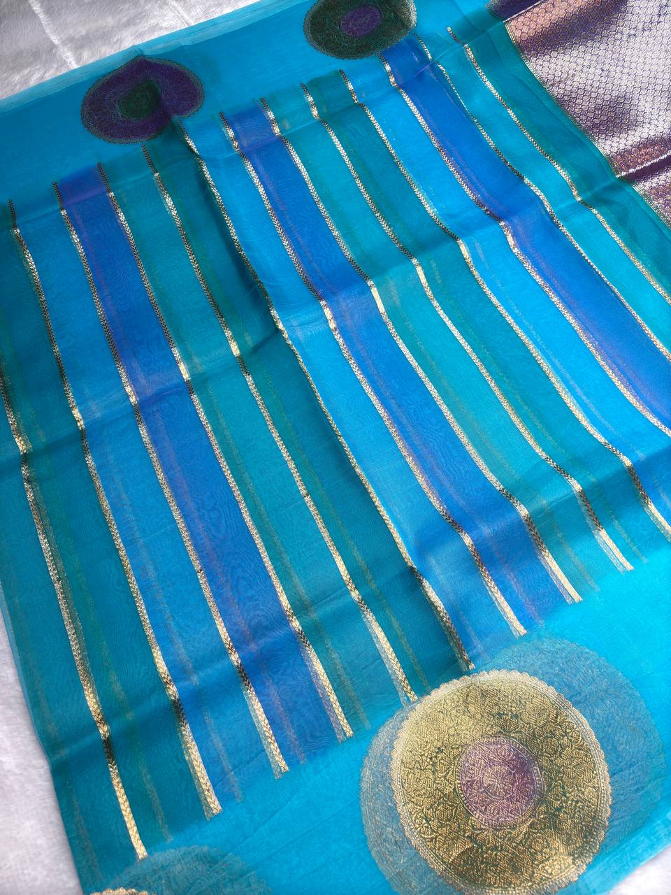 Kora Silk Rungkaat Saree in Firoza Blue with Kadhua Zari Borders