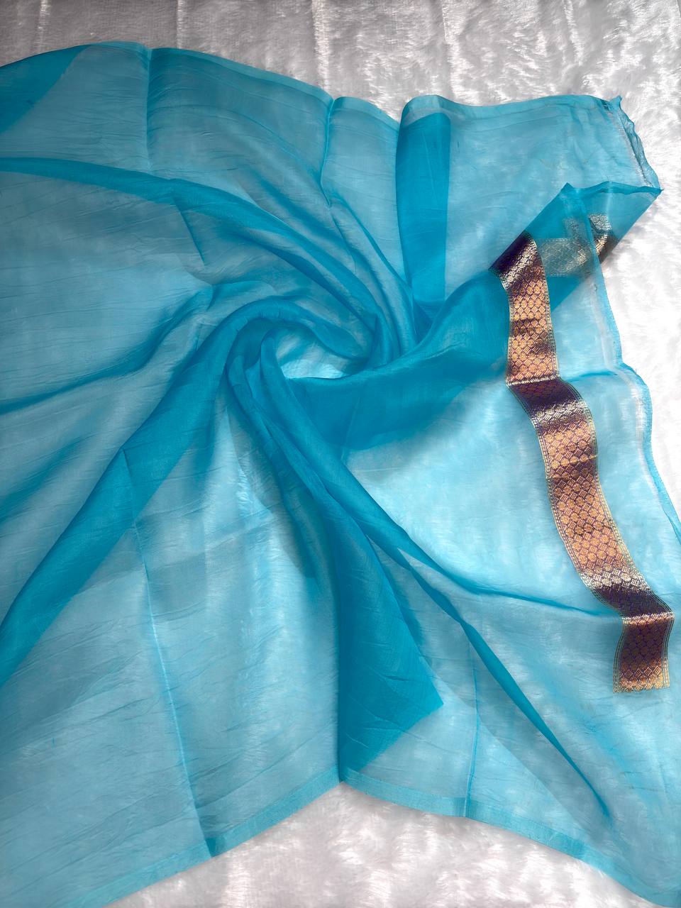 Kora Silk Rungkaat Saree in Firoza Blue with Kadhua Zari Borders