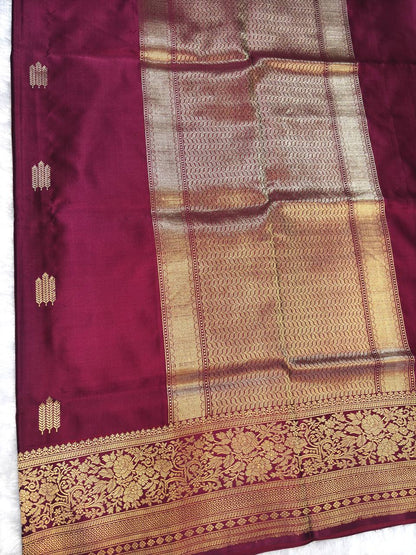 Wine Maroon Mashru Silk Saree with Arrowhead Buti and Elaborate Floral Zari Border