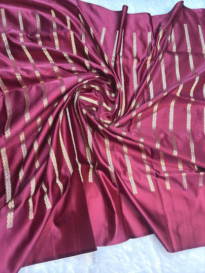 Wine Maroon Mashru Silk Saree with Arrowhead Buti and Elaborate Floral Zari Border