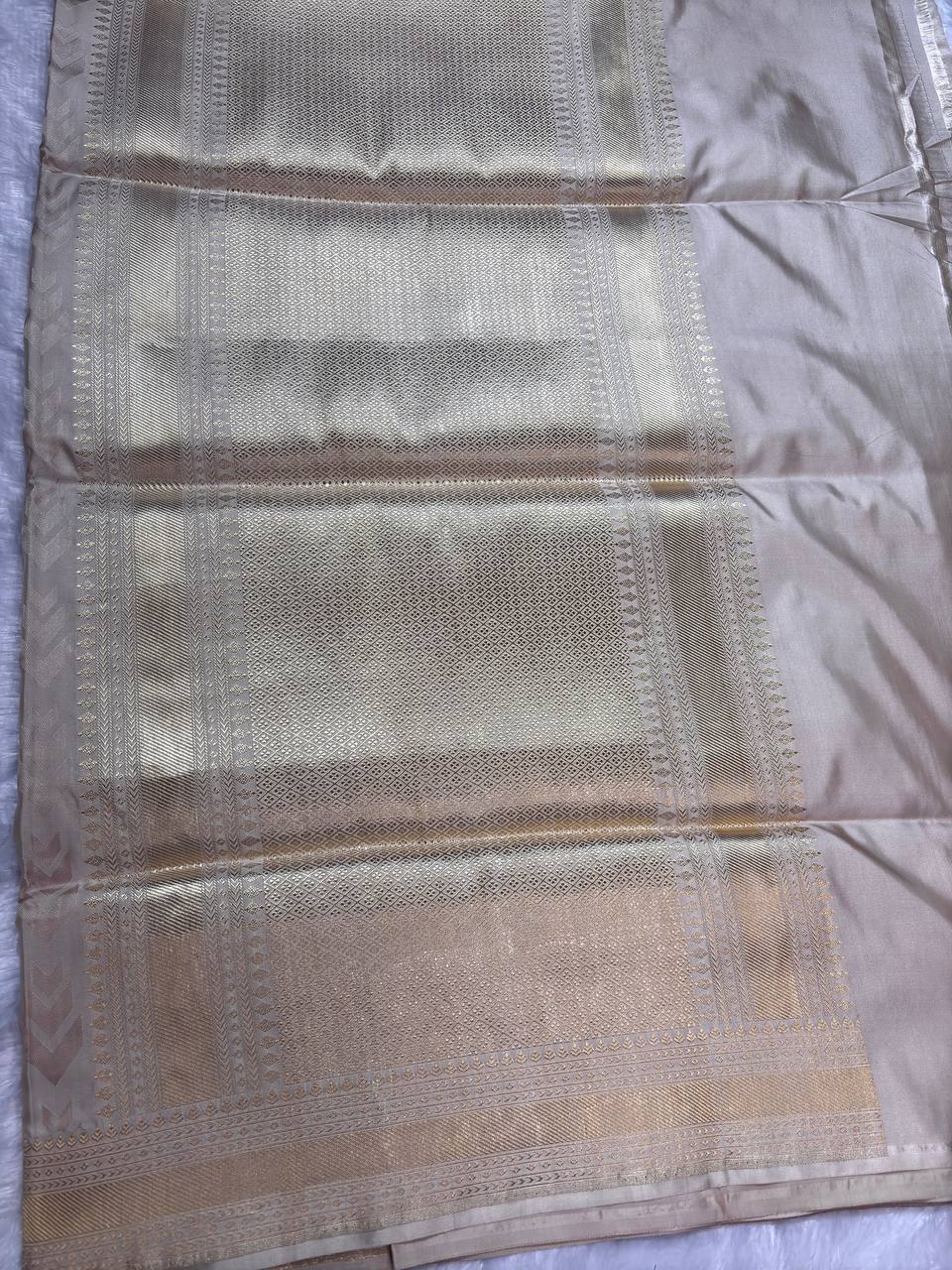 Cream Champagne Katan Silk Banarasi Saree with Geometric Chevron Motifs