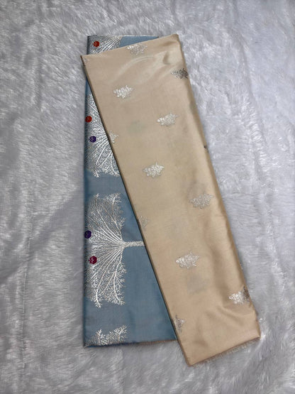 Cream Ivory Pure Katan Silk Saree with Powder Blue Kalpavriksha Border and Silver Zari Pallu