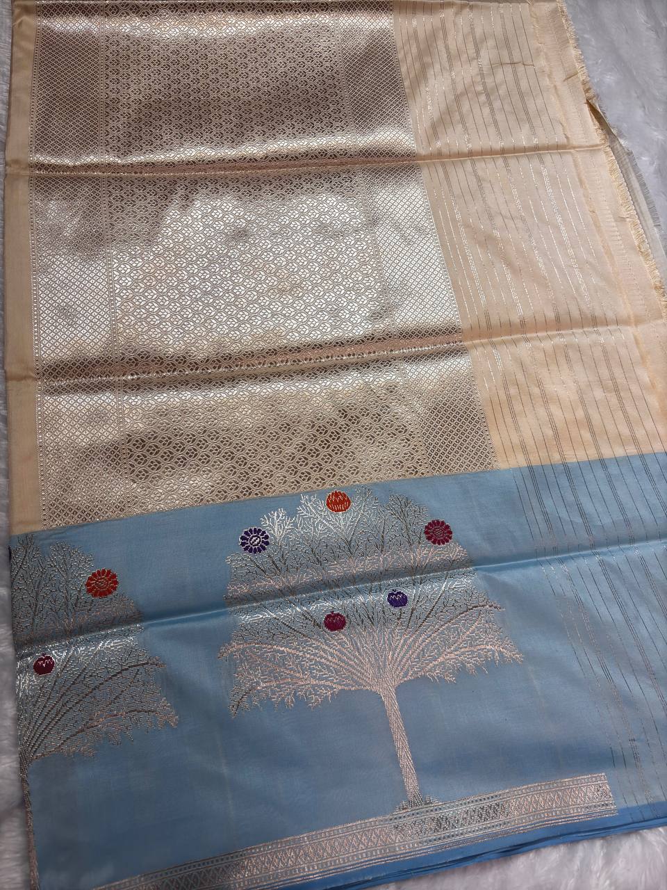 Cream Ivory Pure Katan Silk Saree with Powder Blue Kalpavriksha Border and Silver Zari Pallu