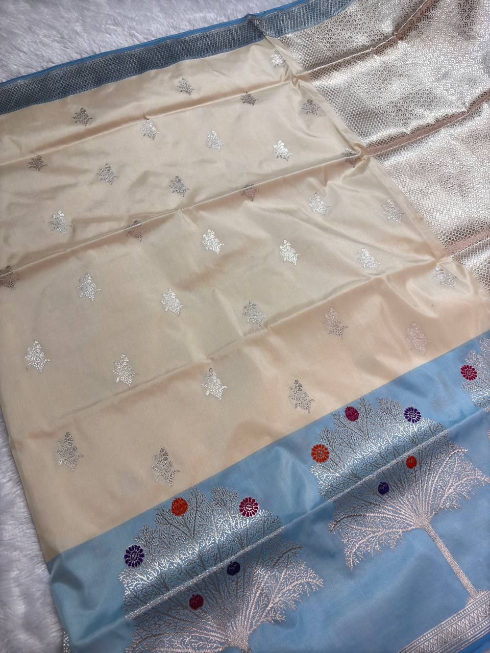 Cream Ivory Pure Katan Silk Saree with Powder Blue Kalpavriksha Border and Silver Zari Pallu
