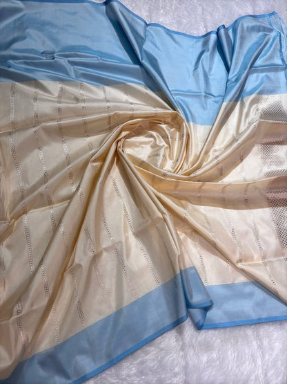 Cream Ivory Pure Katan Silk Saree with Powder Blue Kalpavriksha Border and Silver Zari Pallu