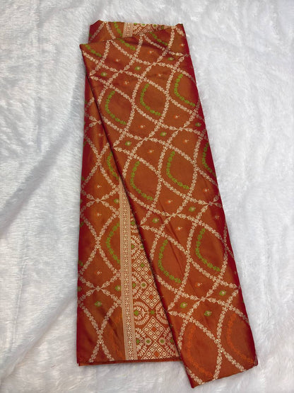 Exquisite Sindoori Red and Mustard Dual-Tone Banarasi Katan Silk Jaal Saree
