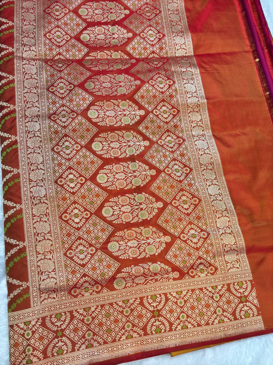 Exquisite Sindoori Red and Mustard Dual-Tone Banarasi Katan Silk Jaal Saree
