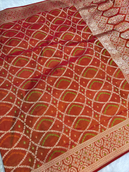 Exquisite Sindoori Red and Mustard Dual-Tone Banarasi Katan Silk Jaal Saree