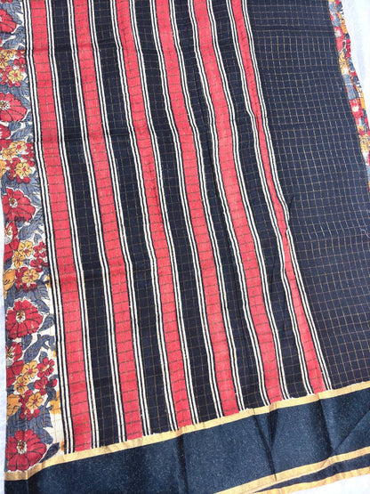 Bold Off-White Tussar Silk Saree with Dense Red and Mustard Kalamkari Floral Patterns and Striated Zari Pallu