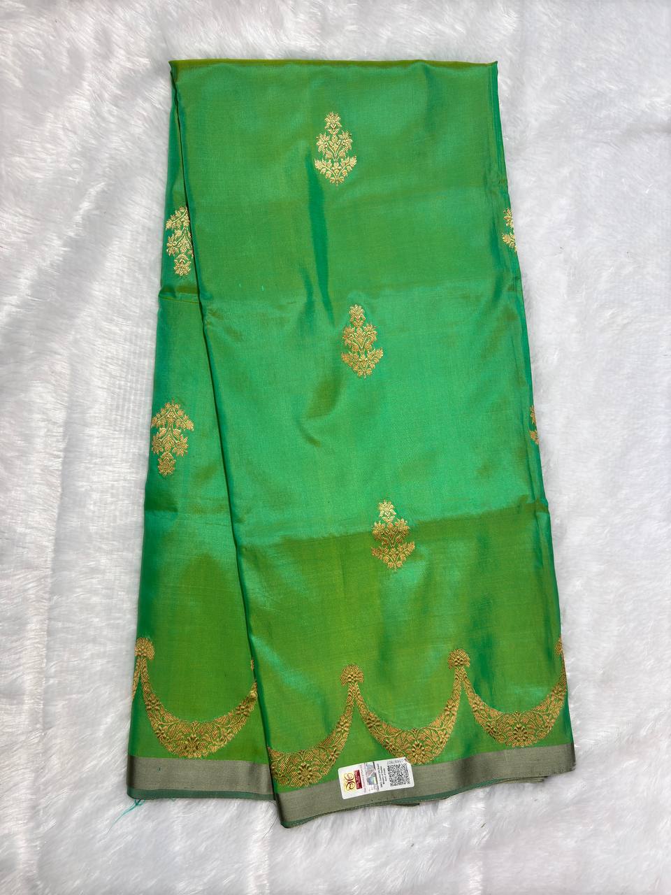Handwoven Mint & Parrot Green Pure Katan Silk Banarasi Saree with Fine Floral Bootis and Scalloped Zari Skirt Border