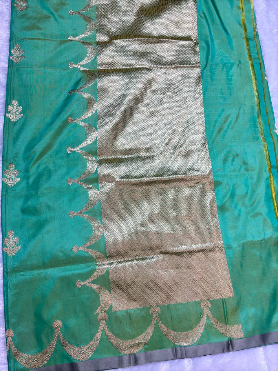 Handwoven Mint & Parrot Green Pure Katan Silk Banarasi Saree with Fine Floral Bootis and Scalloped Zari Skirt Border