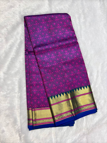 Dual-Tone Peacock Blue & Magenta Pure Katan Silk Banarasi Saree with All-Over Diamond Jaal and Temple Borders