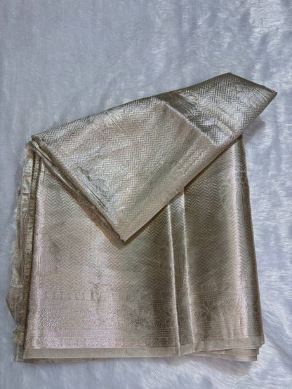 Exquisite Champagne Gold Banarasi Tissue Silk Saree with All-Over Jaal and Chevron Border