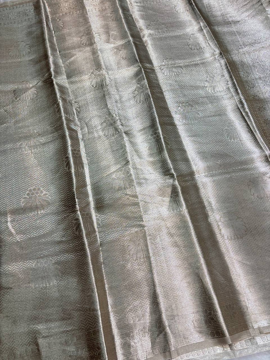 Exquisite Champagne Gold Banarasi Tissue Silk Saree with All-Over Jaal and Chevron Border