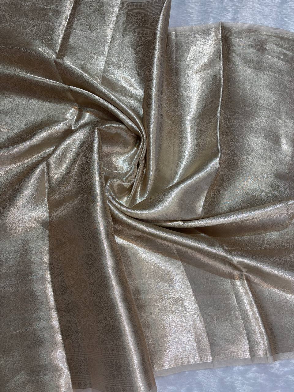 Exquisite Champagne Gold Banarasi Tissue Silk Saree with All-Over Jaal and Chevron Border